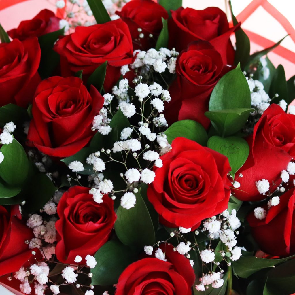 Premium Red Roses Hand Bouquet | Lovely Blooms