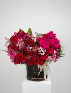 Mixed Red flower Arrangement